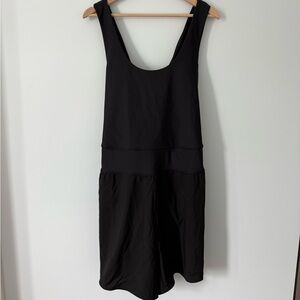 Sleeveless Power Soft 2-in-1 Dolphin-
Hem Performance Run Romper -2.5 inseam